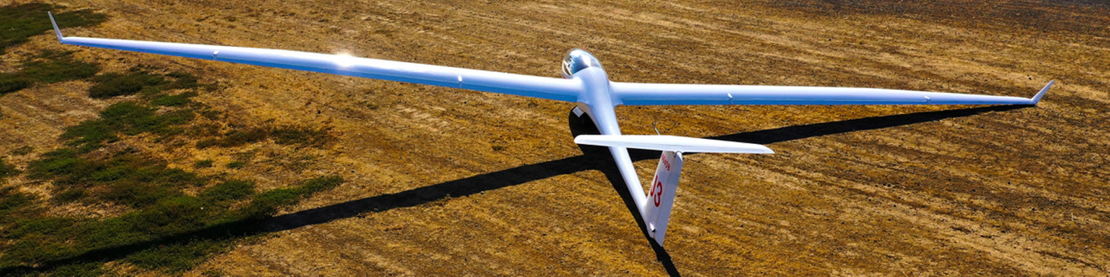 Glider on the ground at sunset